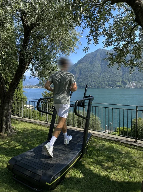 Nick outdoors beside a lake.